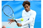 EASTBOURNE, ENGLAND - JUNE 22:  Feliciano Lopez of Spain in action during his men's singles final match against Gilles Simon of France on day eight of the AEGON International tennis tournament at Devonshire Park on June 22, 2013 in Eastbourne, England.  (Photo by Jan Kruger/Getty Images)